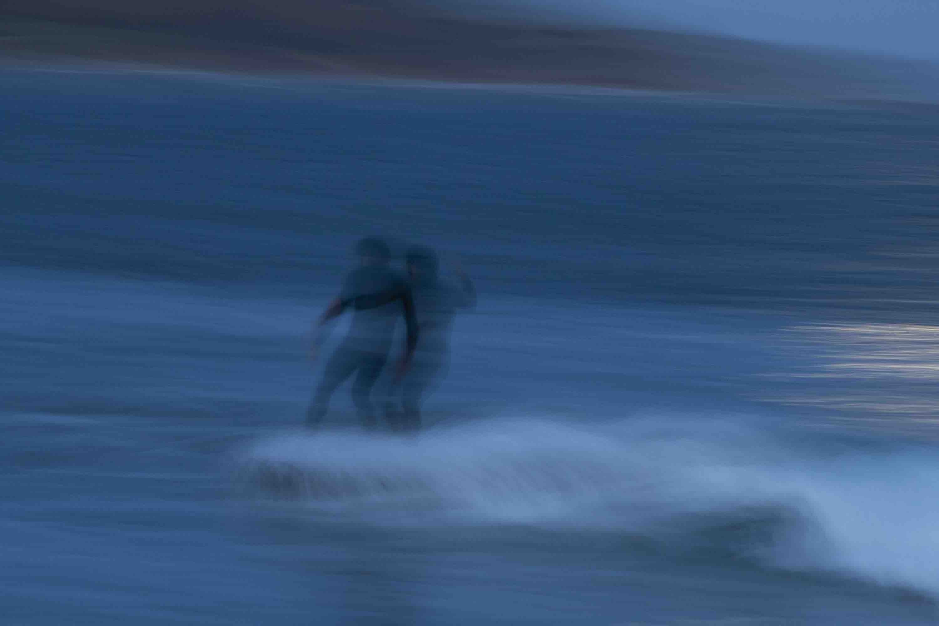 Moonrise double exposure surf photography night moon surfing artistic