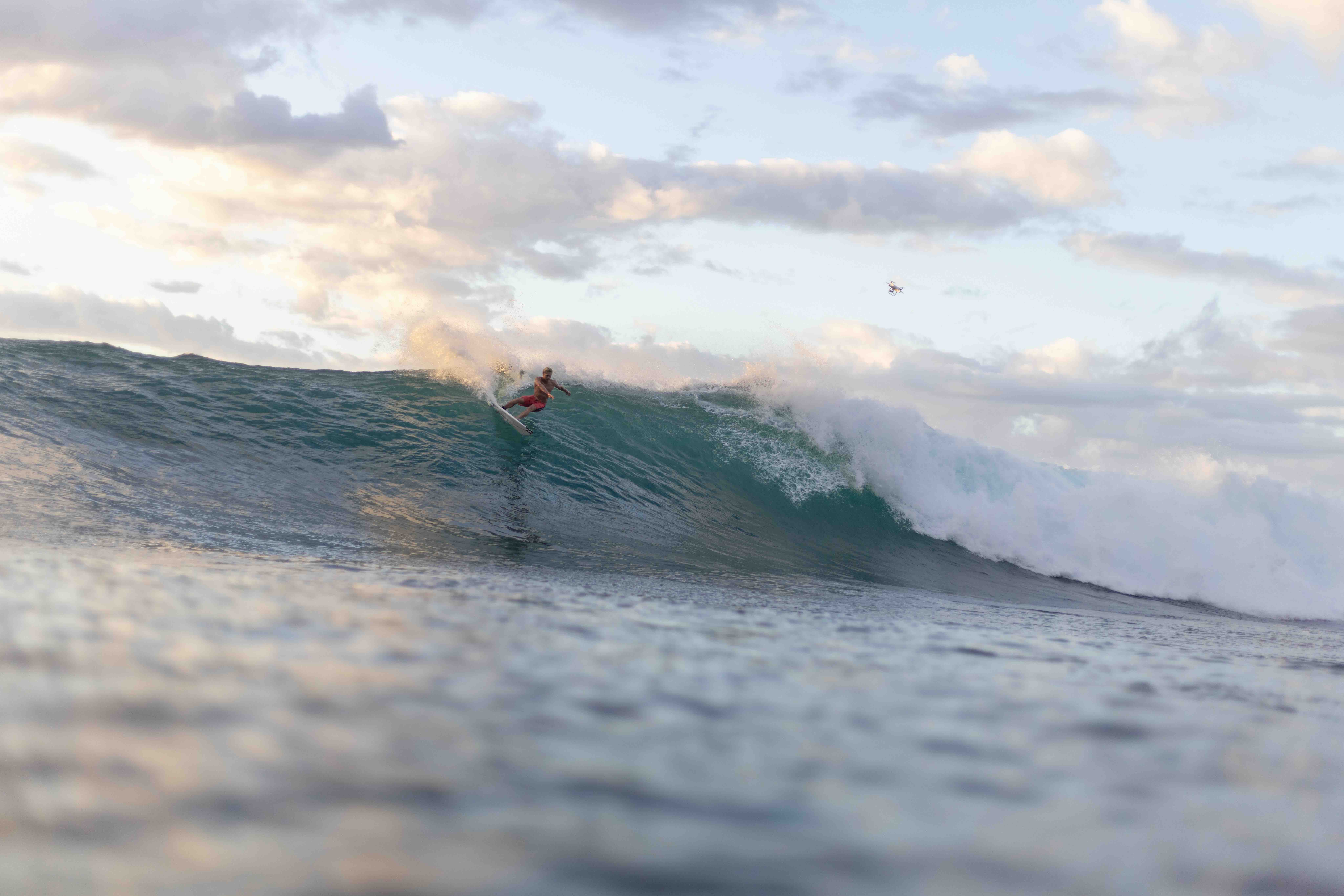 Sunset surf photography golden hour waves ocean silhouette surfer