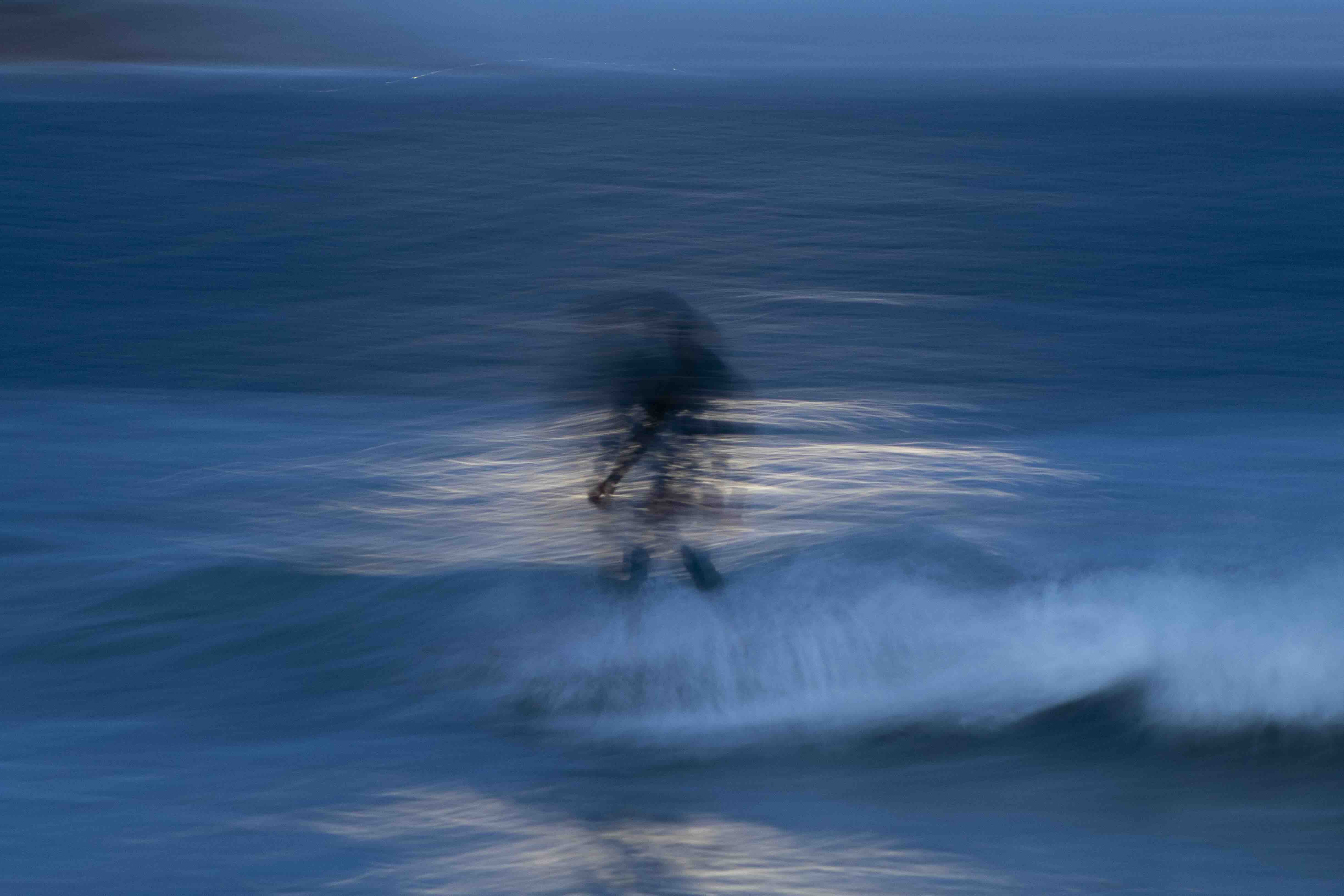 Moonrise surfer